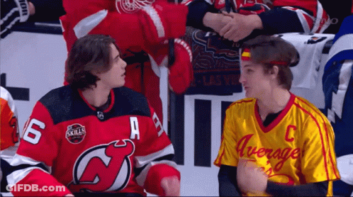 A Hockey Player In A Red Jersey With The Number 6 On It GIF