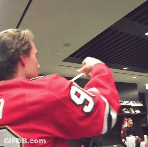 A Hockey Player In A Red Jersey With The Number 6 On It GIF