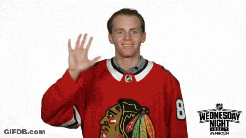 A Hockey Player In A Red Jersey With The Number 8 On It GIF
