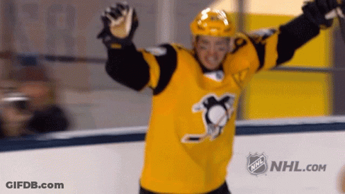 A Hockey Player In A Yellow Jersey With The Nhl Logo GIF