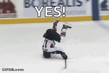 A Hockey Player Is Laying On His Back On The Ice And Says Yes . GIF