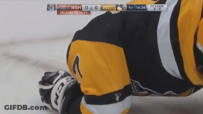 A Hockey Player Is Laying On The Ice With The Scoreboard Showing Pittsburgh Leading 2-0 GIF