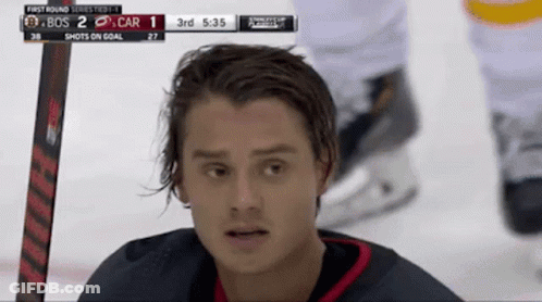 A Hockey Player Is Looking At The Scoreboard Which Says 3Rd At The Top GIF