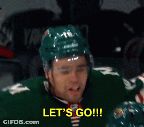 A Hockey Player Is Saying Let 'S Go While Another Player Looks On GIF