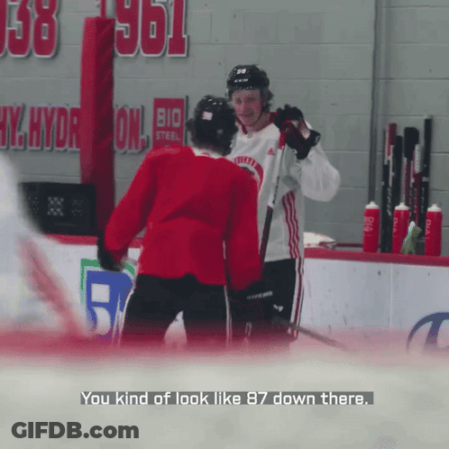 A Hockey Player Is Talking To Another Player With The Words " You Kind Of Look Like 87 Down There " GIF