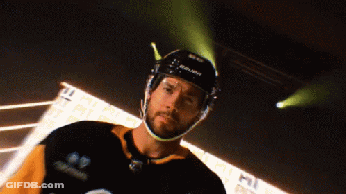 A Hockey Player Is Wearing A Bauer Helmet GIF