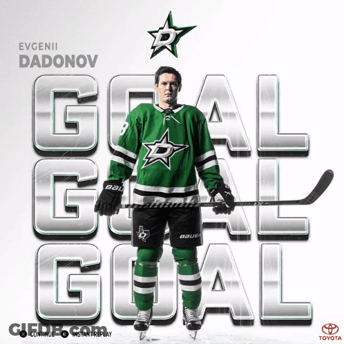A Hockey Player Named Evgenii Dadonov Holds A Hockey Stick GIF