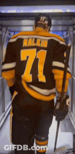 A Hockey Player Named Halkin Is Walking Down A Tunnel GIF