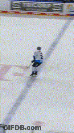 A Hockey Player On The Ice With A Banner That Says Bauer GIF