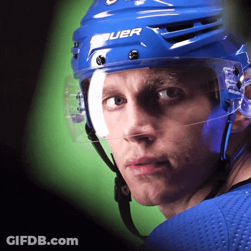 A Hockey Player Wearing A Blue Helmet That Says Bauer On It GIF