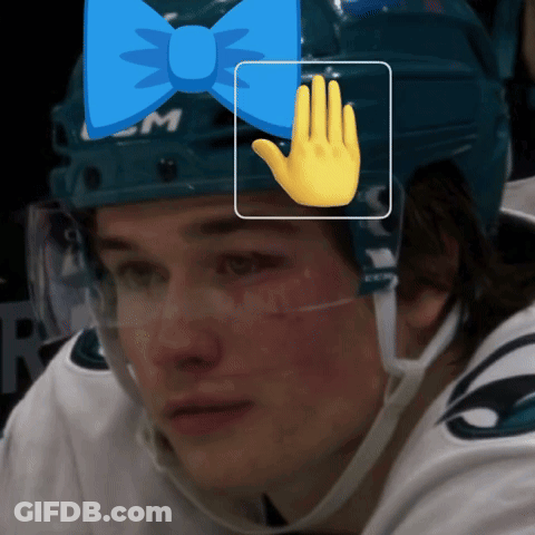 A Hockey Player Wearing A Blue Helmet With A Bow On It GIF