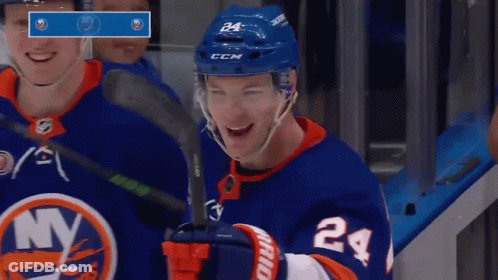 A Hockey Player Wearing A Blue Helmet With The Number 24 On It GIF