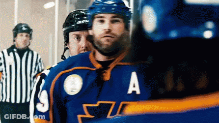 A Hockey Player Wearing A Blue Jersey With The Letter A On The Front GIF