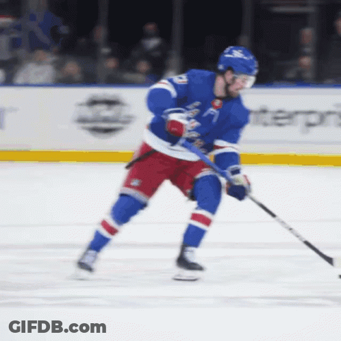 A Hockey Player Wearing A Blue Jersey With The Number 21 On It GIF
