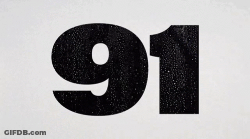 A Hockey Player Wearing A Blue Jersey With The Number 91 On It GIF