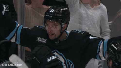 A Hockey Player Wearing A Helmet That Says Bauer GIF