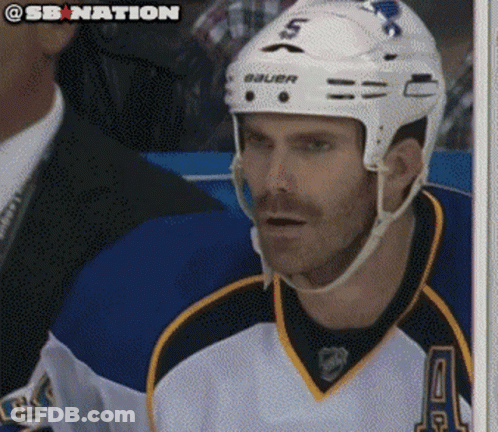 A Hockey Player Wearing A Helmet That Says Bauer GIF