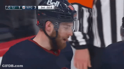 A Hockey Player Wearing A Helmet That Says Bell GIF
