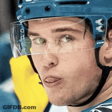 A Hockey Player Wearing A Helmet That Says Ccm GIF