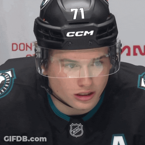 A Hockey Player Wearing A Helmet That Says Ccm On It GIF