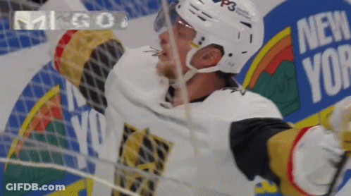 A Hockey Player Wearing A Helmet That Says P3 On It GIF