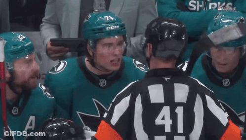 A Hockey Player Wearing A Helmet With The Letters Ccm On It GIF
