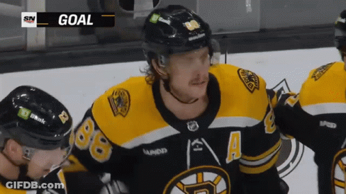 A Hockey Player Wearing A Jersey That Has The Number 88 On It GIF