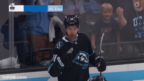 A Hockey Player Wearing A Jersey That Says 88 On It GIF