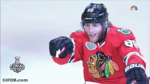 A Hockey Player Wearing A Jersey That Says 88 On It GIF