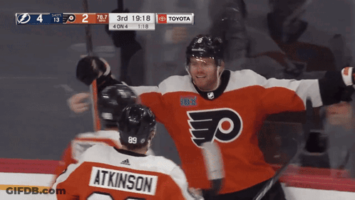 A Hockey Player Wearing A Jersey That Says Atkinson On It GIF