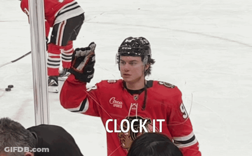 A Hockey Player Wearing A Jersey That Says Clock It GIF
