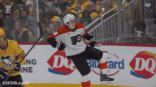 A Hockey Player Wearing A Jersey That Says Flyers Is Skating On The Ice GIF