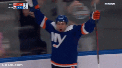 A Hockey Player Wearing A Jersey That Says Ny GIF