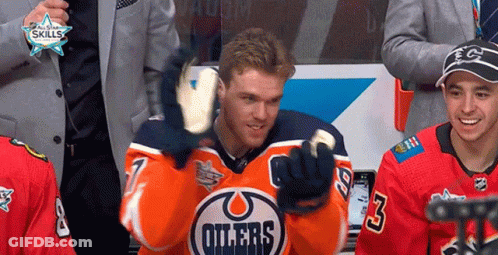 A Hockey Player Wearing A Jersey That Says " Oilers " GIF