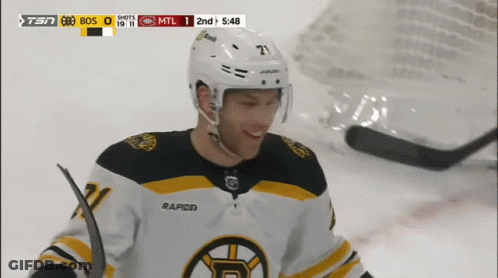 A Hockey Player Wearing A Jersey That Says Rapid On The Back GIF