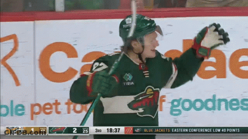 A Hockey Player Wearing A Jersey That Says ' Toyota ' On It GIF