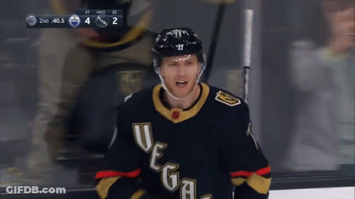 A Hockey Player Wearing A Jersey That Says Vegas GIF