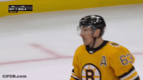 A Hockey Player Wearing A Jersey With A B On It GIF