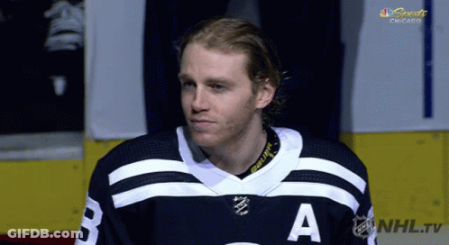 A Hockey Player Wearing A Jersey With The Letter A On The Front GIF