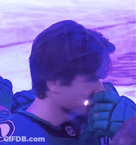 A Hockey Player Wearing A Jersey With The Letter D On It GIF