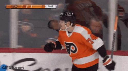 A Hockey Player Wearing A Jersey With The Letter F On The Front GIF