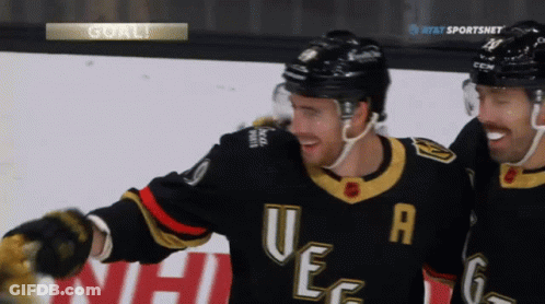 A Hockey Player Wearing A Jersey With The Letter Ue On It GIF