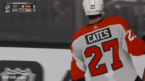 A Hockey Player Wearing A Jersey With The Name Cates On It GIF