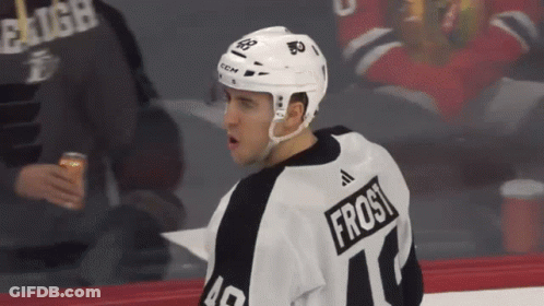 A Hockey Player Wearing A Jersey With The Name Frost On It GIF