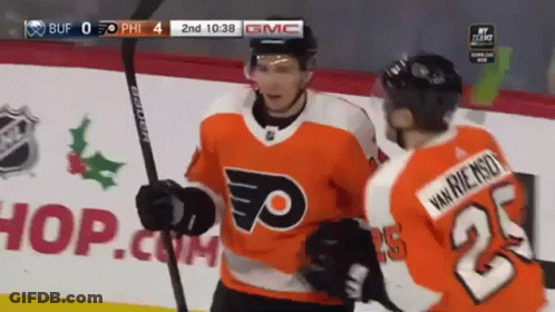 A Hockey Player Wearing A Jersey With The Number 23 On It GIF