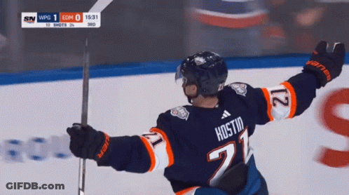 A Hockey Player Wearing A Jersey With The Number 27 On It GIF
