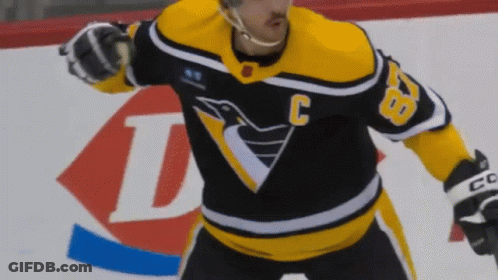 A Hockey Player Wearing A Jersey With The Number 28 On It GIF