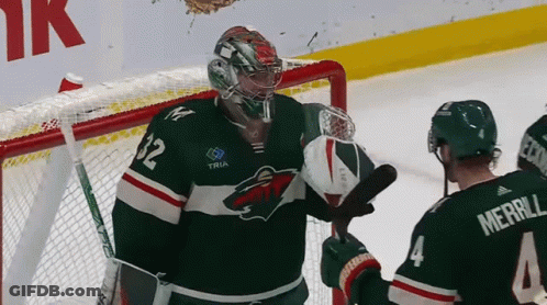 A Hockey Player Wearing A Jersey With The Number 32 On It GIF