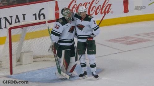 A Hockey Player Wearing A Jersey With The Number 33 On It GIF