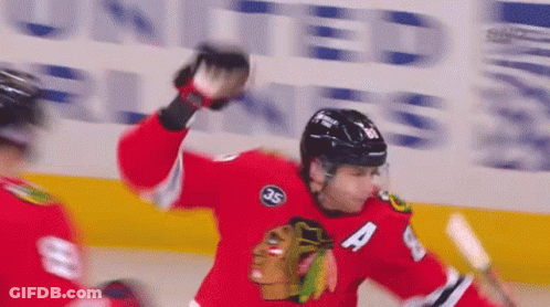 A Hockey Player Wearing A Jersey With The Number 4 On It GIF